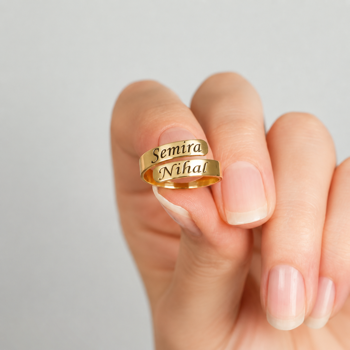 Personalisierter Wickelring mit zwei Namen – vergoldet